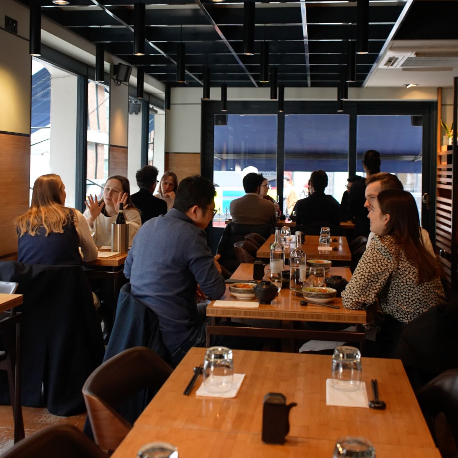 customers-enjoying-the-food-at-kazu-japanese-restaurant-in-fitzrovia